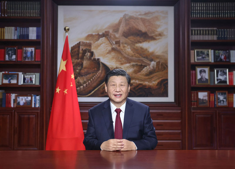 新年前夕,国家主席习近平通过中央广播电视总台和互联网,发表二〇二一年新年贺词。新华社记者 鞠鹏 摄